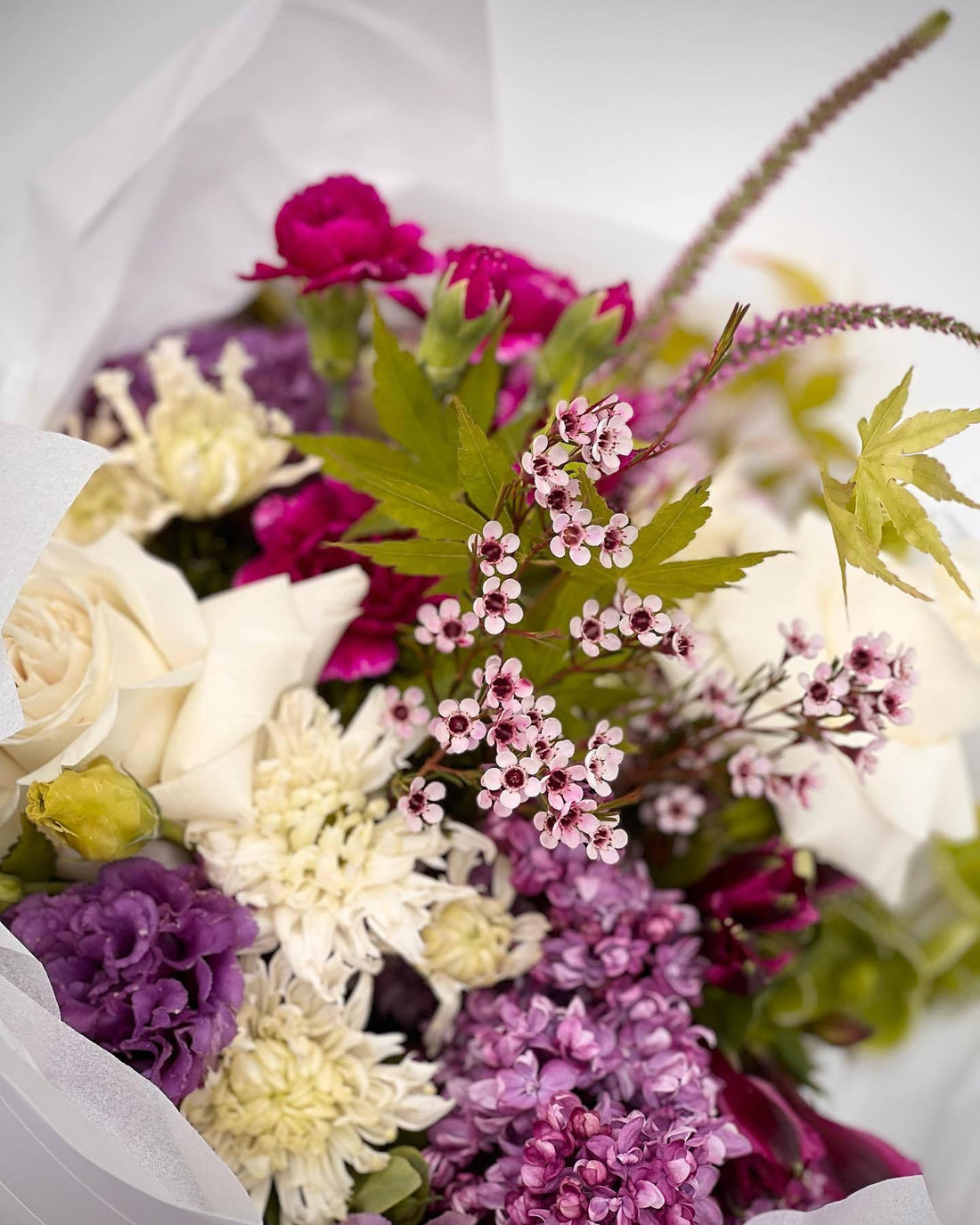 A gorgeous arrangement with some incredible Lilac 💜 <br />
<br />
Florist’s Choice Medium Wrapp - Flowers Gold Coast